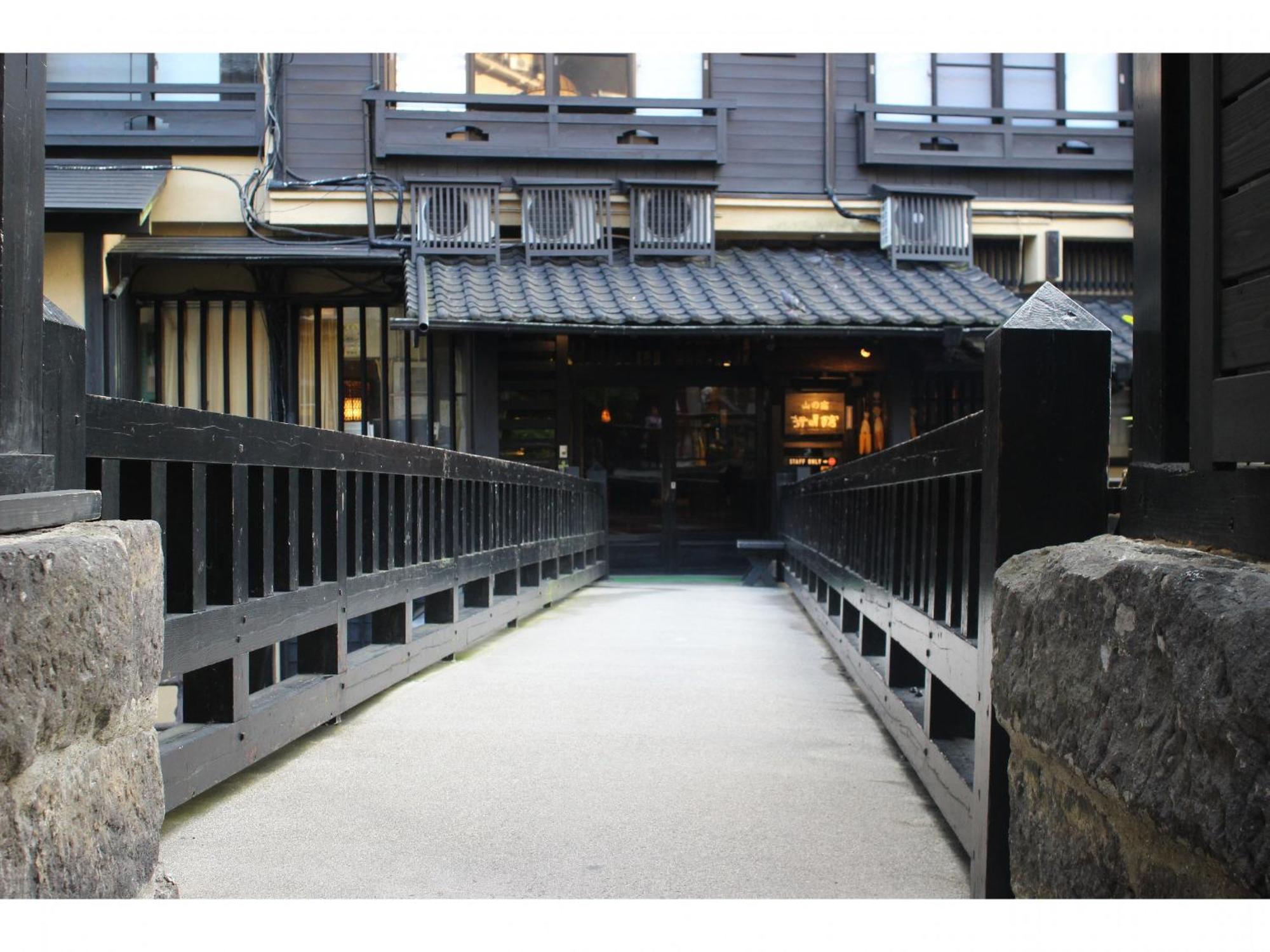 Отель Kurokawa Onsen Yama No Yado Shinmeikan Минамиогуни Экстерьер фото